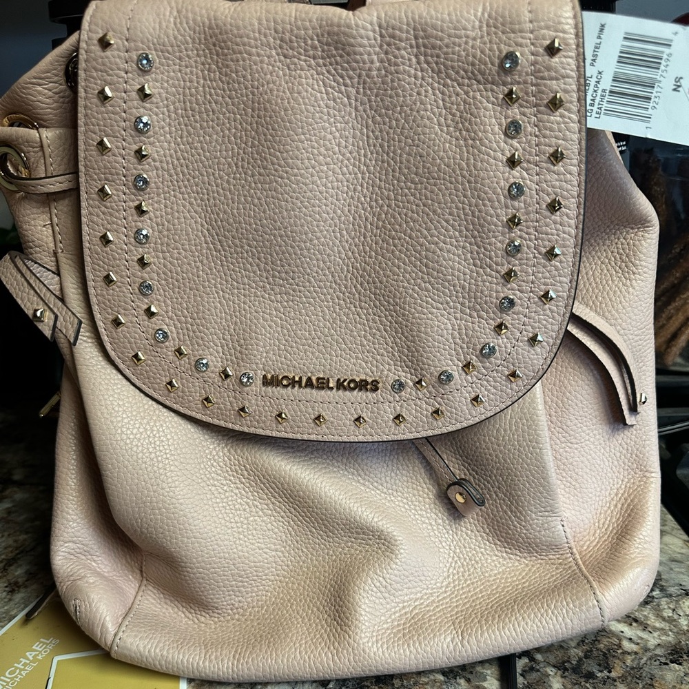 Used Once- New with tags MK blush studded backpack.
